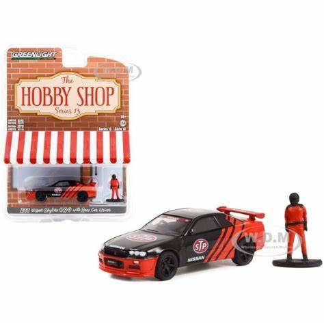 GreenLight GL-97130-E 1/64 1999 Nissan Skyline (R34) with Race Driver (8847290794221)