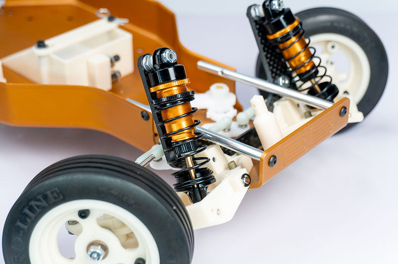 Koswork KOS04191-5 RC10 12mm Gold Body Black Big Bore Buggy Shock Set (F & R) Team Associated (9001930031341)