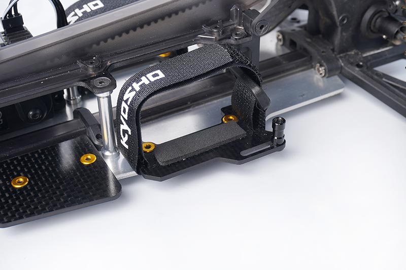 Koswork KOS04323 Kyosho Mid Optima 2022 Carbon Shorty Lipo Battery Mount Set (9001930850541)