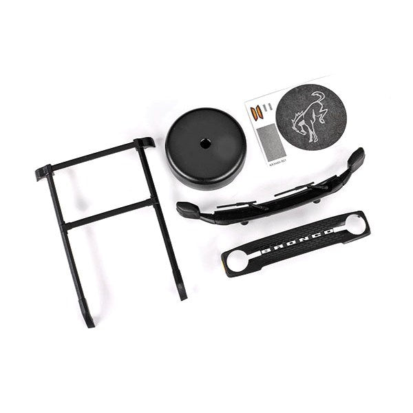Traxxas 9715 - Roof rack/ spare tire cover/ cowl/ grille (fits #9711 body) (8120429478125)